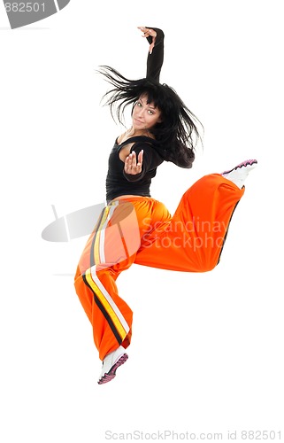 Image of Dancer woman in jump look at camera