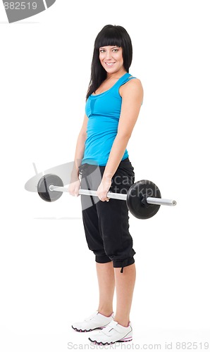 Image of Happy woman lifting bar with weights