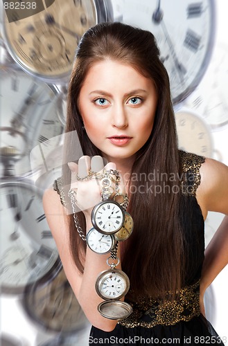 Image of Woman with pocket watches