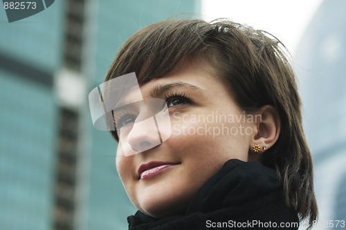 Image of Woman in city closeup