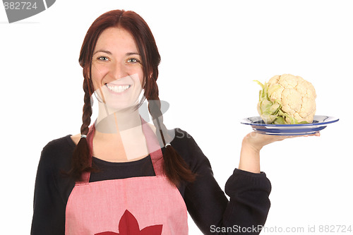 Image of housewife holding plate with cauliflower
