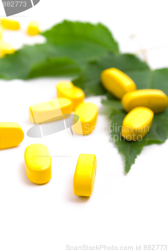 Image of yellow vitamin pills