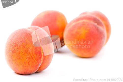 Image of four peaches