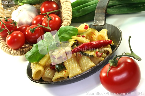 Image of noodles with fiery chili and zucchini