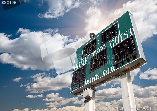 Image of HIgh School Score Board on a Blue Sky