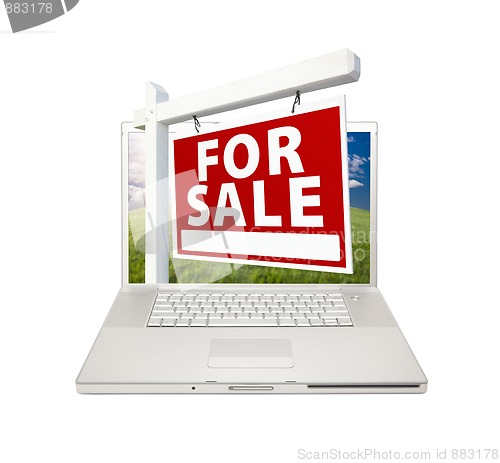 Image of For Sale Real Estate Sign on Laptop 