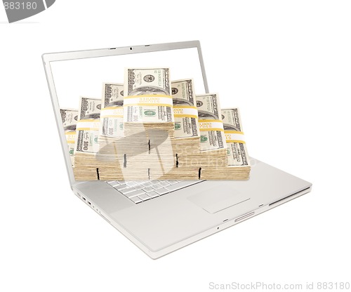 Image of Laptop with Stacks of Money Coming From Screen
