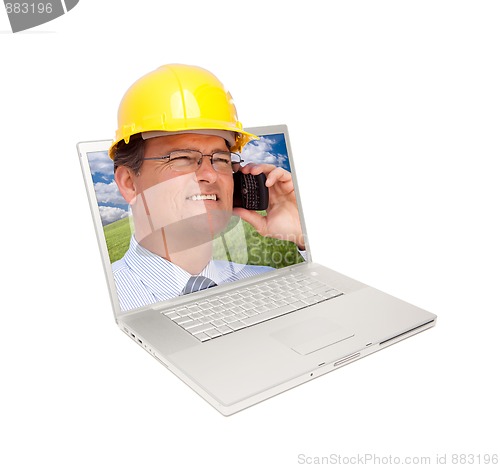 Image of Laptop and Man with Hard Hat on Cell Phone