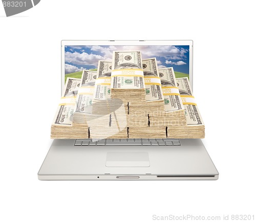 Image of Laptop with Stacks of Money Coming From Screen