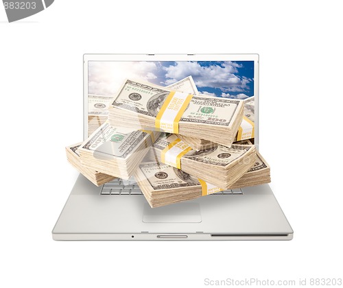 Image of Laptop with Stacks of Money Coming From Screen