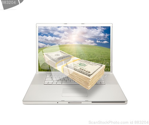Image of Laptop with Stack of Money Coming From Screen