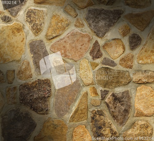 Image of Masonry wall with irregular shaped stones 