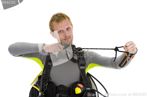 Image of diver teaching how to make a knot