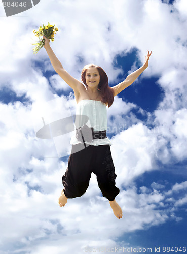 Image of Young woman in jump