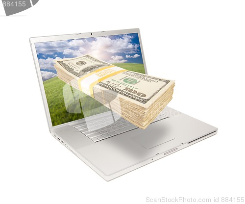 Image of Laptop with Stack of Money Coming From Screen