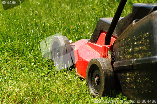 Image of Lawnmower on grass