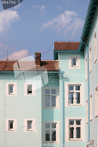 Image of Exterior of building with red roof