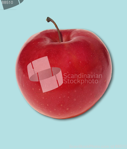 Image of apple on blue