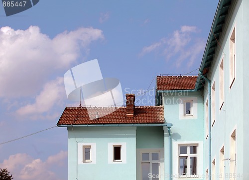 Image of Exterior of building with red roof