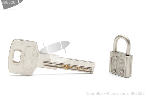 Image of Big key and a small padlock isolated