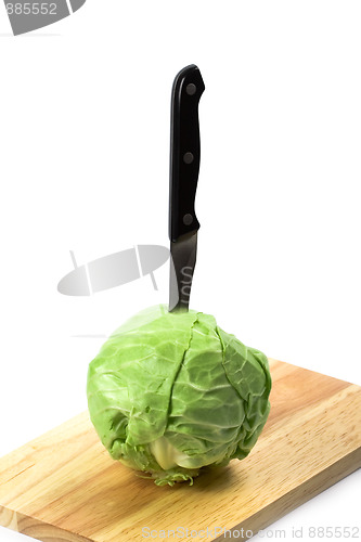 Image of green cabbage with knife