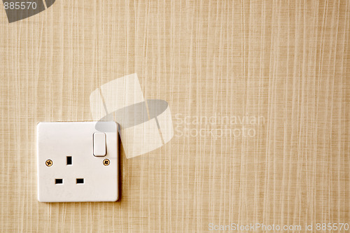 Image of Power outlet at the corner of a wall