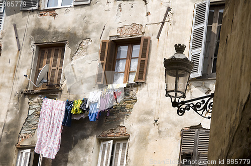 Image of laundry hanging medieval architecture bastia corsica