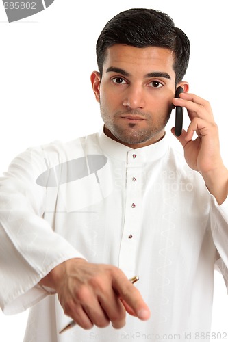 Image of Arab ethnic man pointing finger