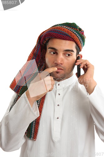 Image of Pondering arab businessman