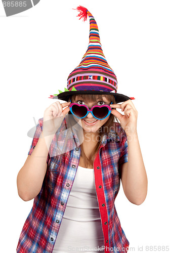 Image of Beautiful girl smiles in sunglasseses and colour hat