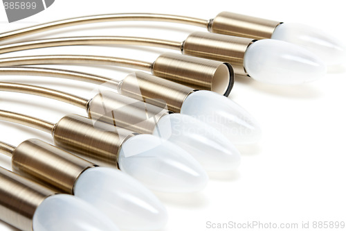 Image of Electric light bulbs in golden patron