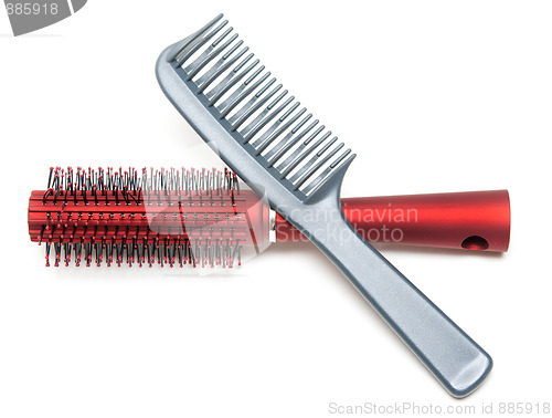 Image of Two combs, red and sulfuric