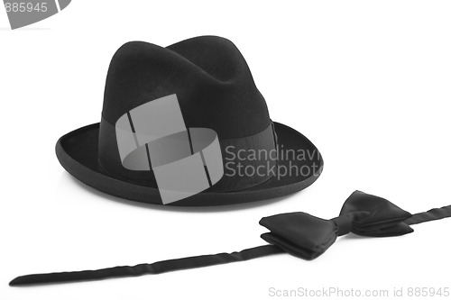 Image of black vintage hat and bow-tie on white background