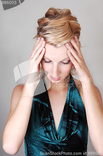 Image of Young girl with headache.