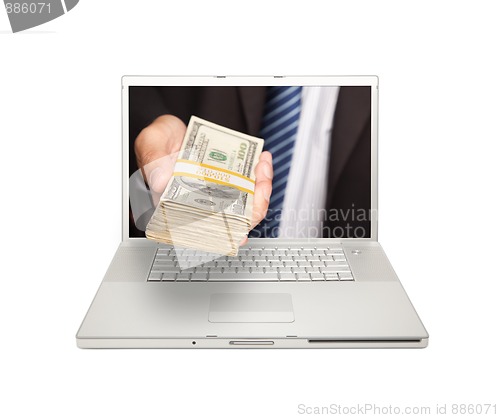 Image of Businessman Handing Stack of Money Through Laptop Screen