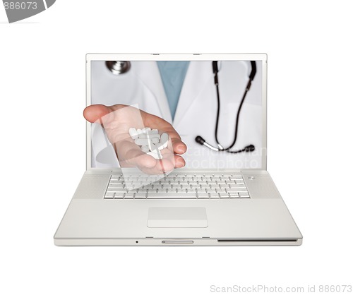 Image of Doctor Handing Pills Through Laptop Screen