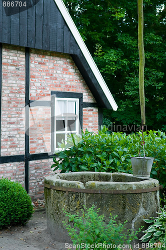Image of Old Farm Building with Well