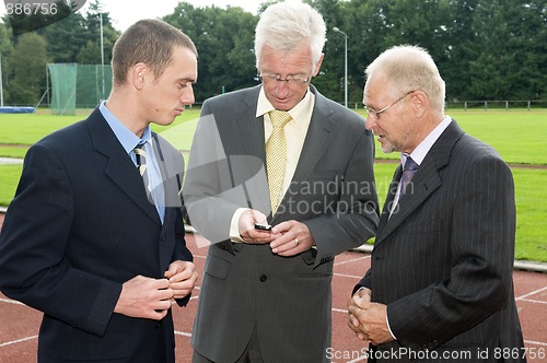 Image of Discussing On A Racetrack