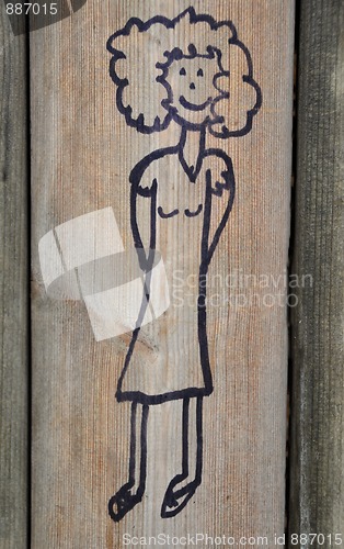 Image of Scribble of a girl on playground wall