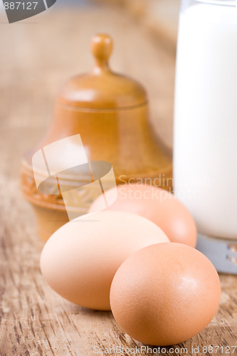 Image of brown eggs and milk