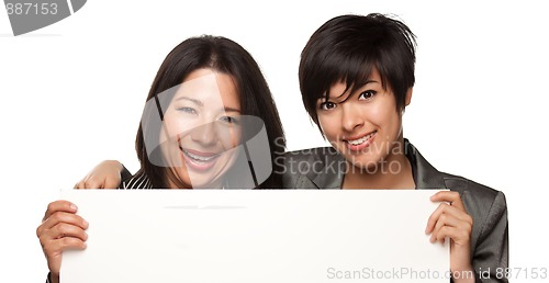 Image of Attractive Multiethnic Mother and Daughters Holding Blank White 