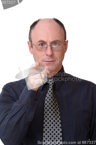 Image of Business man points his index finger towards the camera