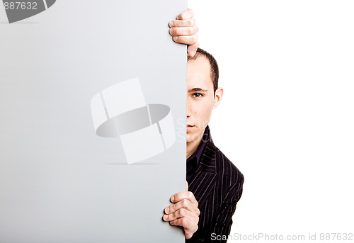 Image of Businessman showing something