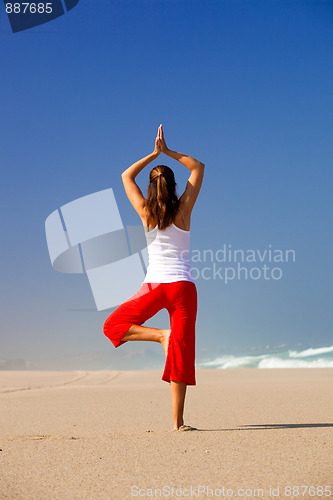 Image of Young woman making Yoga