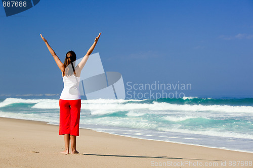 Image of Young woman making Yoga