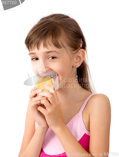 Image of The girl eats a patty