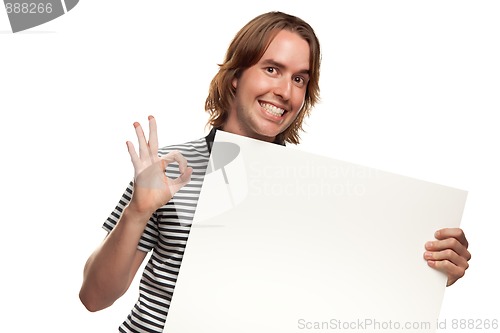Image of Fun Young Man Holding Blank White Sign