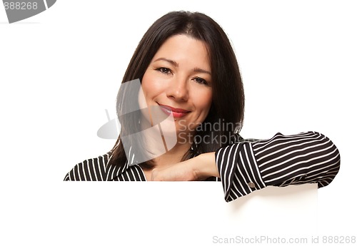 Image of Attractive Multiethnic Woman Behind Blank Sign Corner