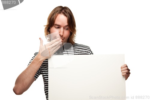 Image of Fun Young Man Holding Blank White Sign
