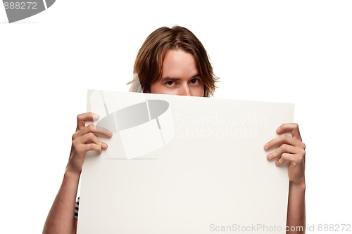 Image of Fun Young Man Holding Blank White Sign